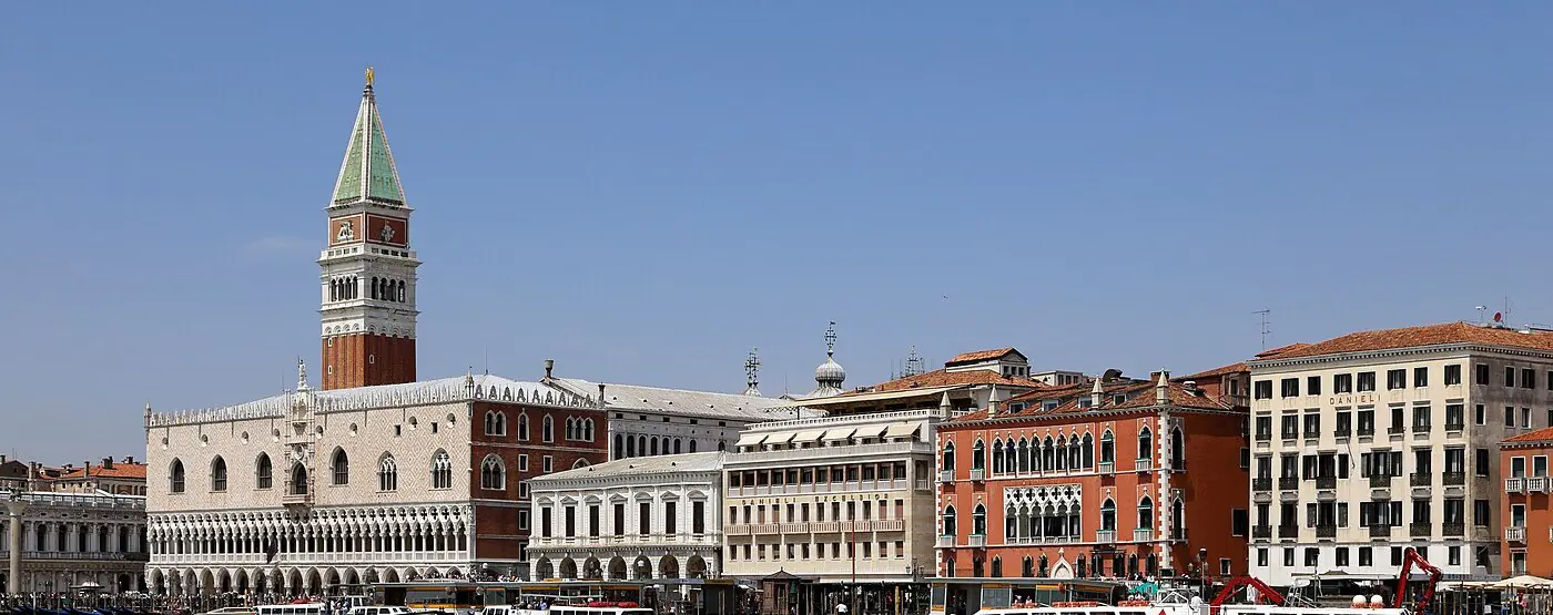 The Riva degli Schiavoni waterfront in Venice, with the Campanile, the Doge's Palace, and the Hotel Danieli